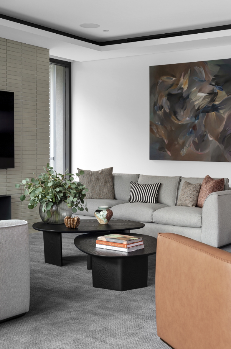 Modern living room with sofa and abstract wall art