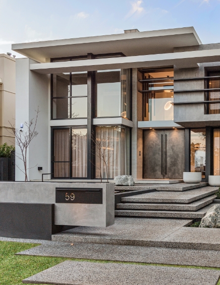 Modern house facade with large windows and steps