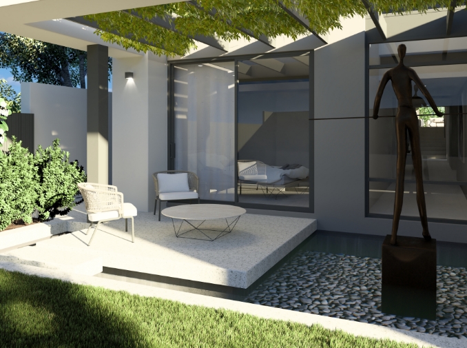 Modern patio with sculpture and garden view.