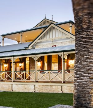 Elegant historic home exterior at twilight